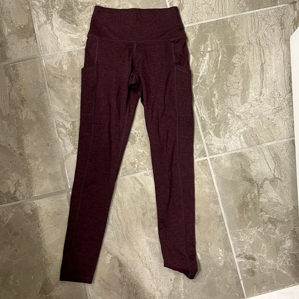 Aerie Maroon colored Leggings in size M with pockets